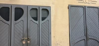 Doors in a backyard of turin. Amazing secrets hidden in this Italian city.