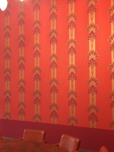 Palazzo Castiglioni wallpaper is beautiful and red.