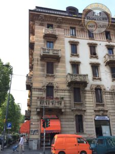 orange van in the art nouveau city of Turin Italy