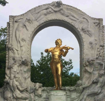 Detail of the golden statue of Johann Strauss in Wien, Austria.