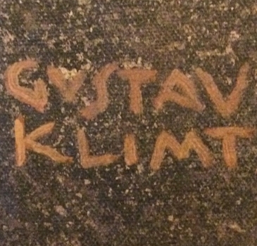 Detail of a Gustav Klimt signature on a painting.