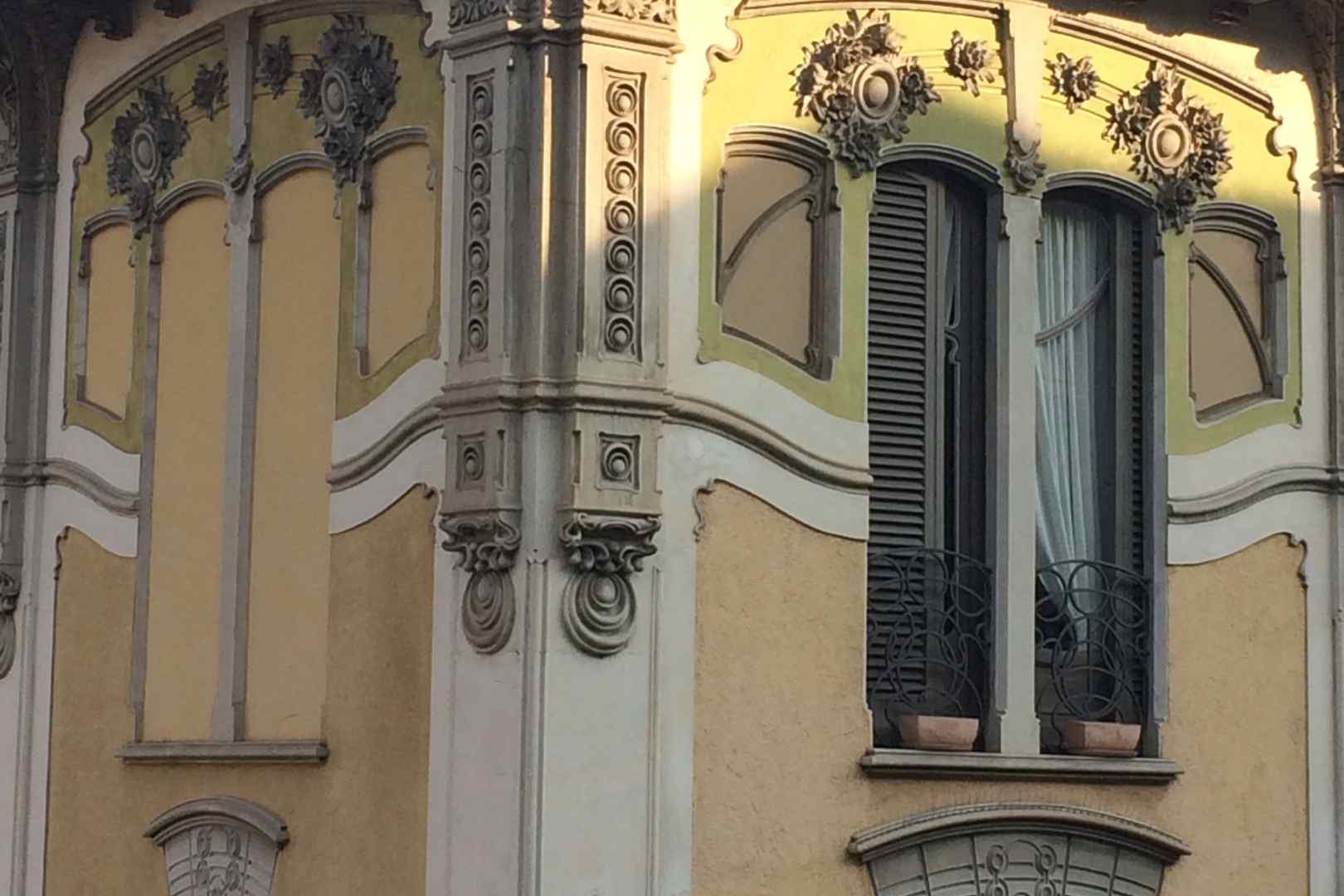 Liberty style details in a building in Turin.