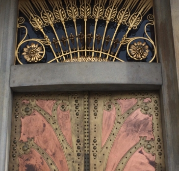 Art nouveau design on a door in Prague, Europe.