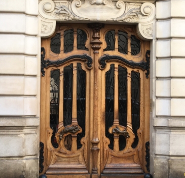 Art nouveau wooden door featuring some beautiful works.